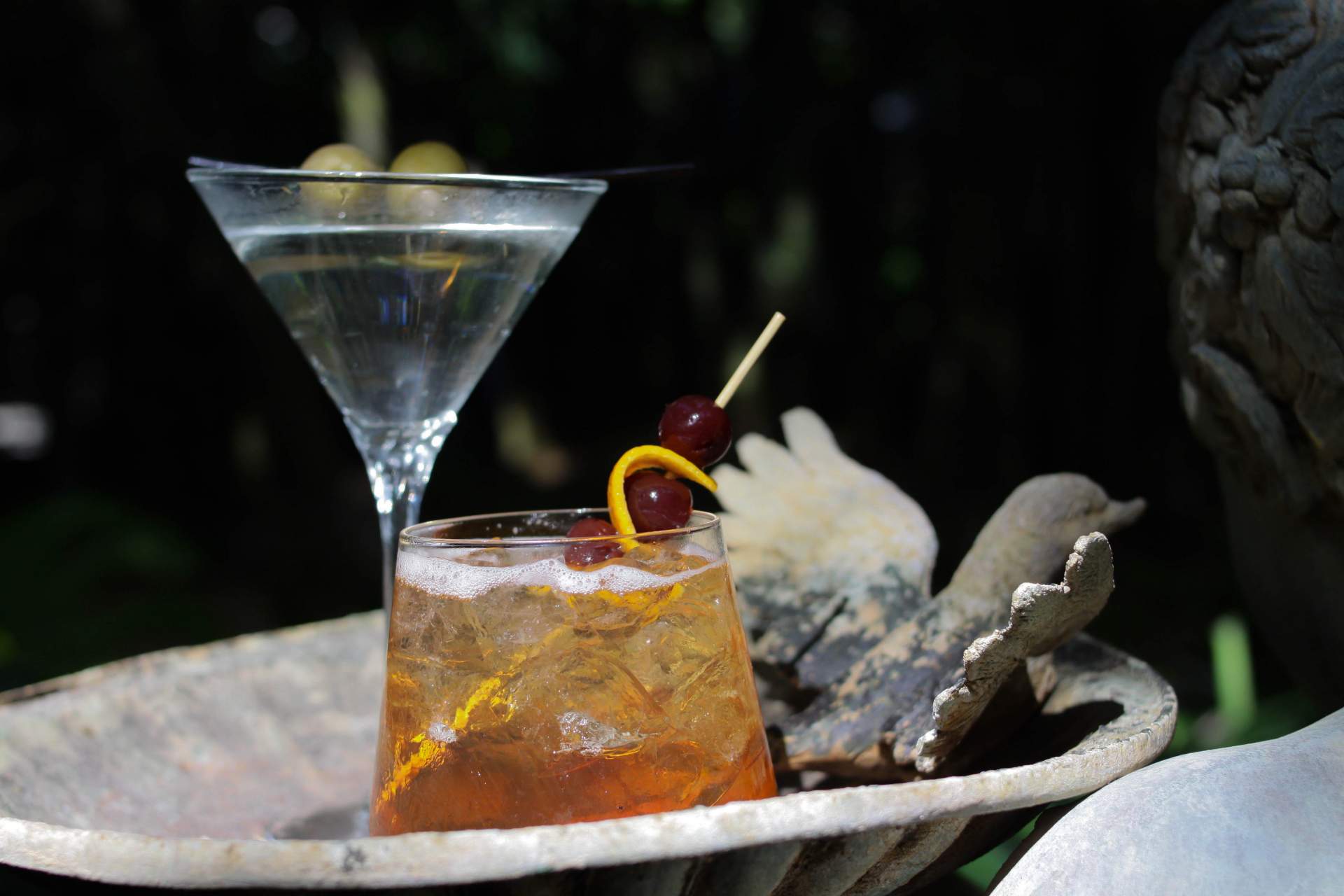 Martini, cosmo and blue cheese on statue